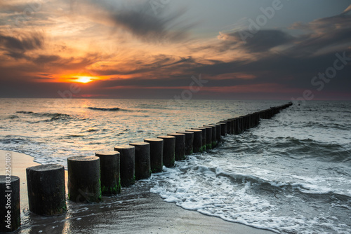 Fototapeta Naklejka Na Ścianę i Meble -  Beautiful summer sunset in Rewal. Polish Baltic Sea. Rewal. Poland. Polish Sea.