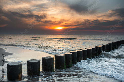 Fototapeta Naklejka Na Ścianę i Meble -  Beautiful summer sunset in Rewal. Polish Baltic Sea. Rewal. Poland. Polish Sea.
