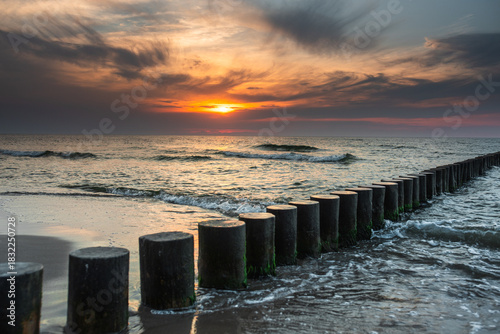 Fototapeta Naklejka Na Ścianę i Meble -  Beautiful summer sunset in Rewal. Polish Baltic Sea. Rewal. Poland. Polish Sea.