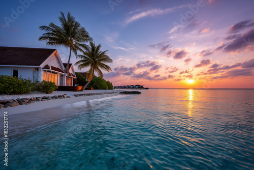 Fototapeta Naklejka Na Ścianę i Meble -  Sunset scene at Maldives beach, luxury water lodges. Travel destinations