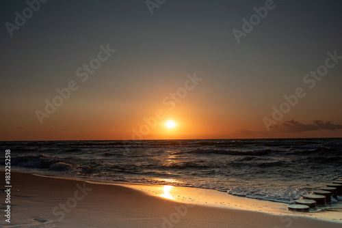Fototapeta Naklejka Na Ścianę i Meble -  Beautiful summer sunset in Rewal. Polish Baltic Sea. Rewal. Poland. Polish Sea.