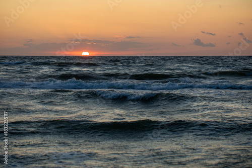 Fototapeta Naklejka Na Ścianę i Meble -  Beautiful summer sunset in Rewal. Polish Baltic Sea. Rewal. Poland. Polish Sea.