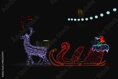 Colorful Christmas lights and decorations in park Dardin in Split, Croatia. December night in the park.