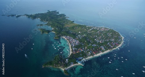 Logon Beach and Boats in Malapascua Island Seashore in Cebu, Philippines. Sulu Sea, Boats and Beautiful Seascape in Background. Drone 4k
