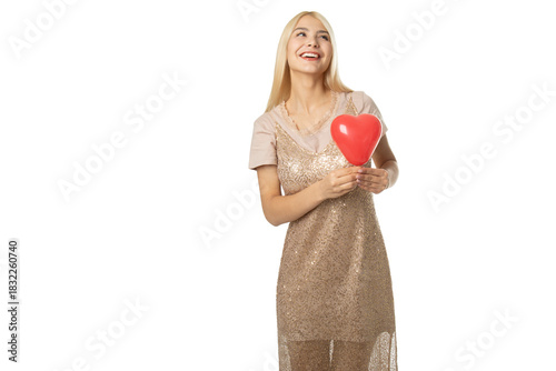 Smiling girl with red heart balloon