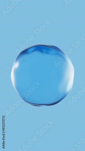 Realistic water bubble on blue backdrop. Abstract liquid distorted sphere. Vertical video
