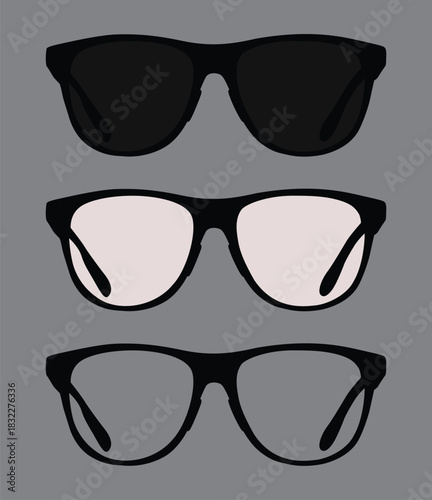 Three color eyewear glasses on a gray background