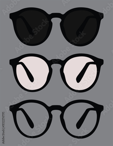 An empty frame is decorated with two glasses in black and white