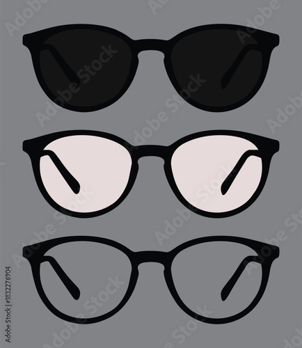 An empty frame is decorated with two glasses in black and white