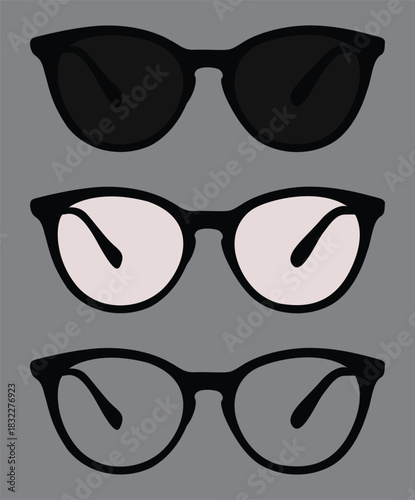 An empty frame is decorated with two glasses in black and white