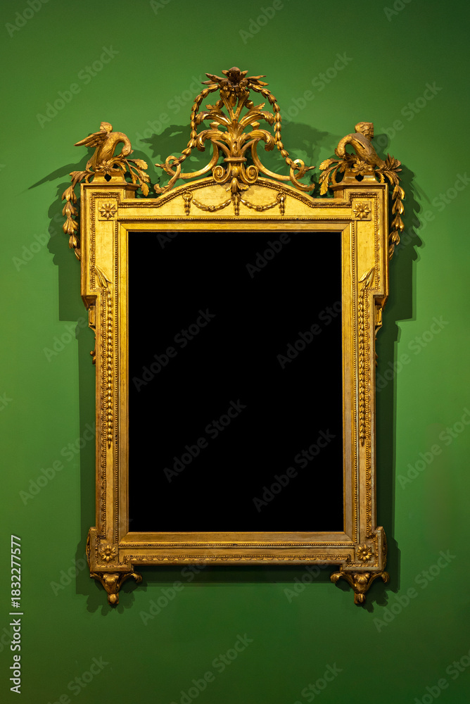 custom made wallpaper toronto digitalOrnate golden frame on a green wall. Vintage luxury style mockup with black copy space for portraits or art.