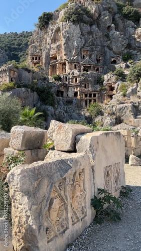 Myra archaeological site with rock tombs in Demre, Turkey. The Ancient City of Myra is especially famous for its Lycian-Era rock tombs, Roman-Era theatre