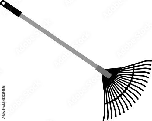Garden rake with black head and long handle on white background copy space