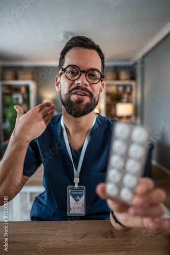 Doctor teleconsulting patients, explaining medication during video call