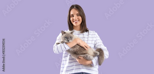 Happy young woman holding c...