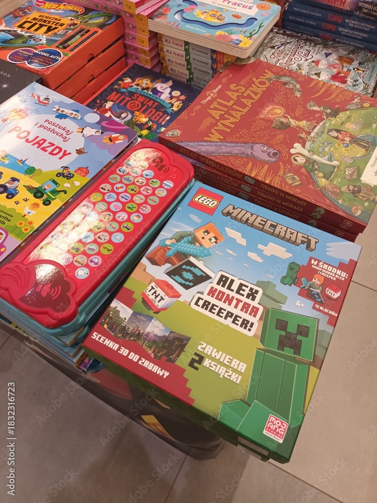 Fototapeta premium LEGO Minecraft Alex Contrasts Creeper Board Game with Other Children's Books