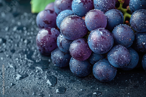 Fresh Organic Dark Purple Grapes with Dew Drops Top View