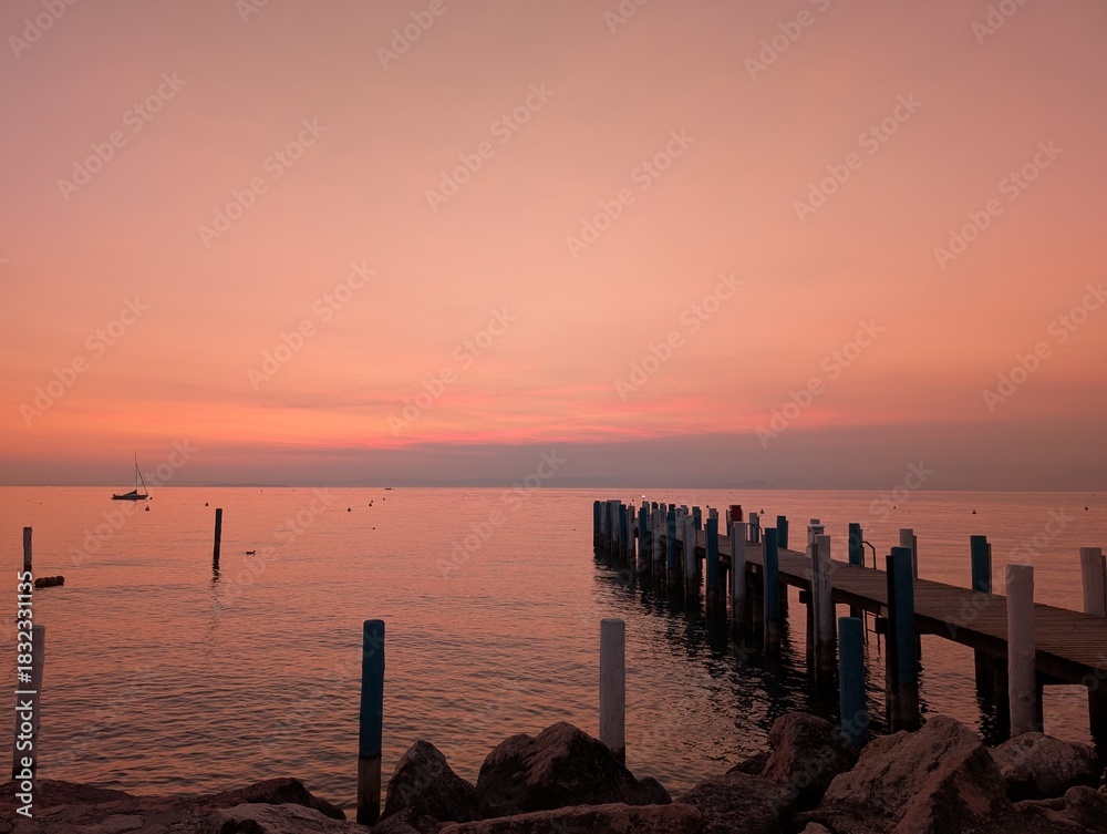 Fototapeta premium Peaceful lakeside sunset in Italy