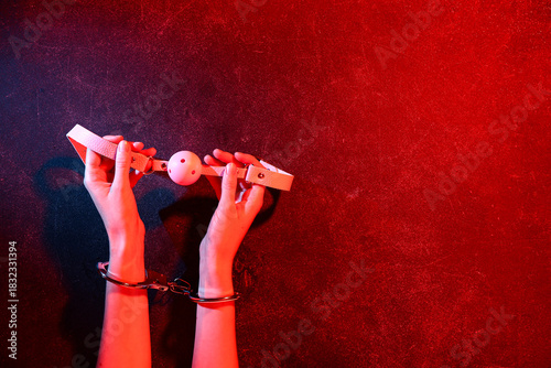 Handcuffed woman with mouth...