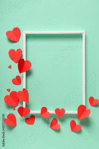 Red paper hearts and white ...