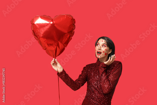Beautiful surprised woman w...