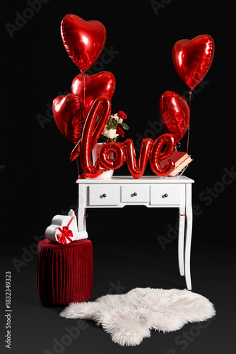 Table with pouf and decor f...