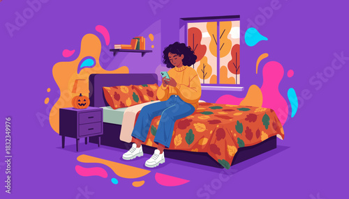 Young woman relaxes in her bedroom using a phone ready for autumn and Halloween