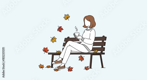 Woman enjoying a hot drink on a park bench during autumn.