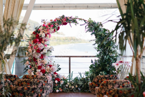 Coziness and style. Modern event design. European traditional wedding ceremony decoration and lounge zone in the restaurant before the reception.