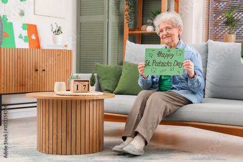 Senior woman holding festiv...