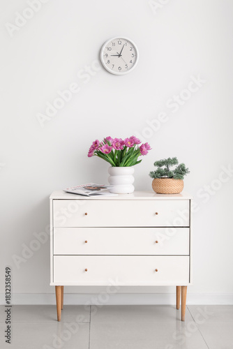 Vase with tulips and bonsai...