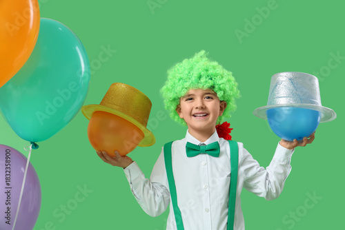 Cute little boy in clown wi...