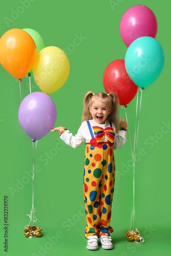 Funny girl in clown costume...