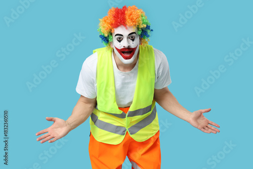 Funny young man as clown bu...