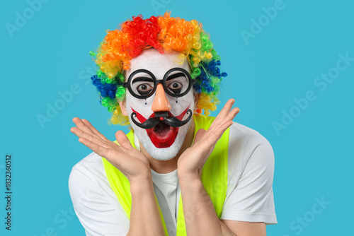 Shocked young man as clown ...