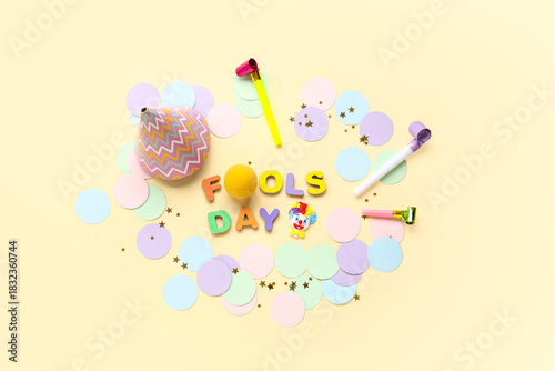 Text FOOLS DAY with clown n...