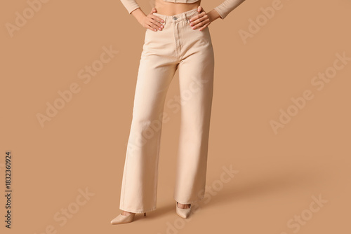 Stylish woman posing in tre...