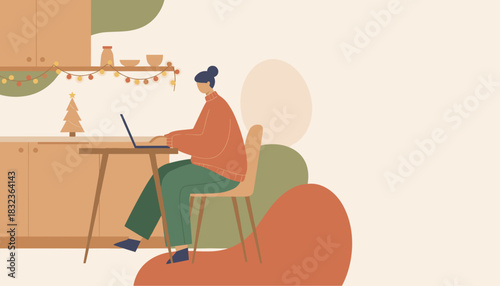 Woman working remotely on laptop in cozy Christmasdecorated home kitchen office