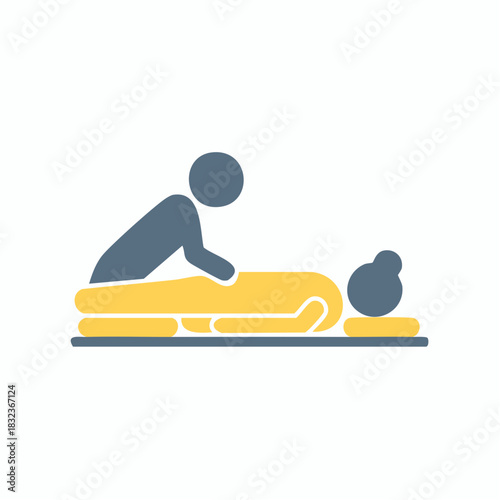 Massage therapist giving a back massage to a client on a table glyph icon