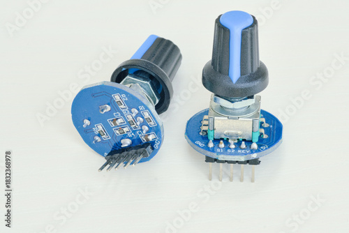 Φωτογραφία Variable resistor isolated on white background