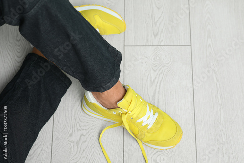 Person wearing bright yello...