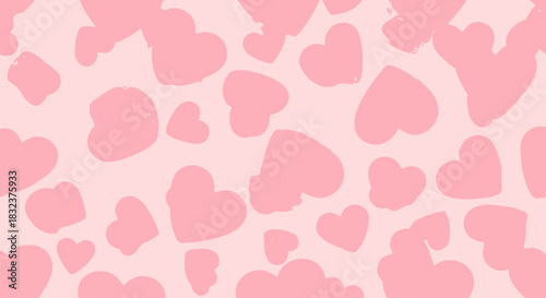 Pink heart pattern background with various sized hearts.