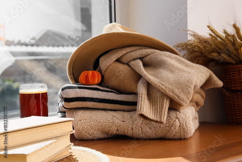 Cozy autumn window scene wi...