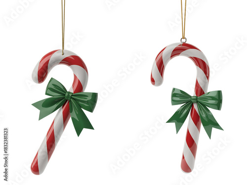 Two classic red and white candy cane christmas ornaments tied with green ribbon bows, hanging against transparent background