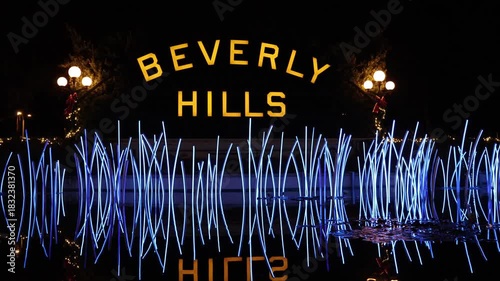 Beverly Hills, California: Beverly Hills Sign and illuminated fountain at Beverly Gardens Park on Santa Monica Blvd