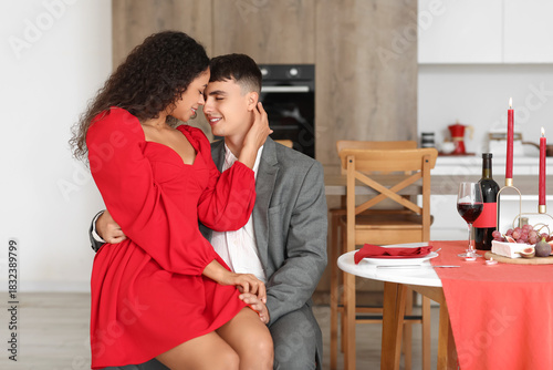 Loving young couple kissing...