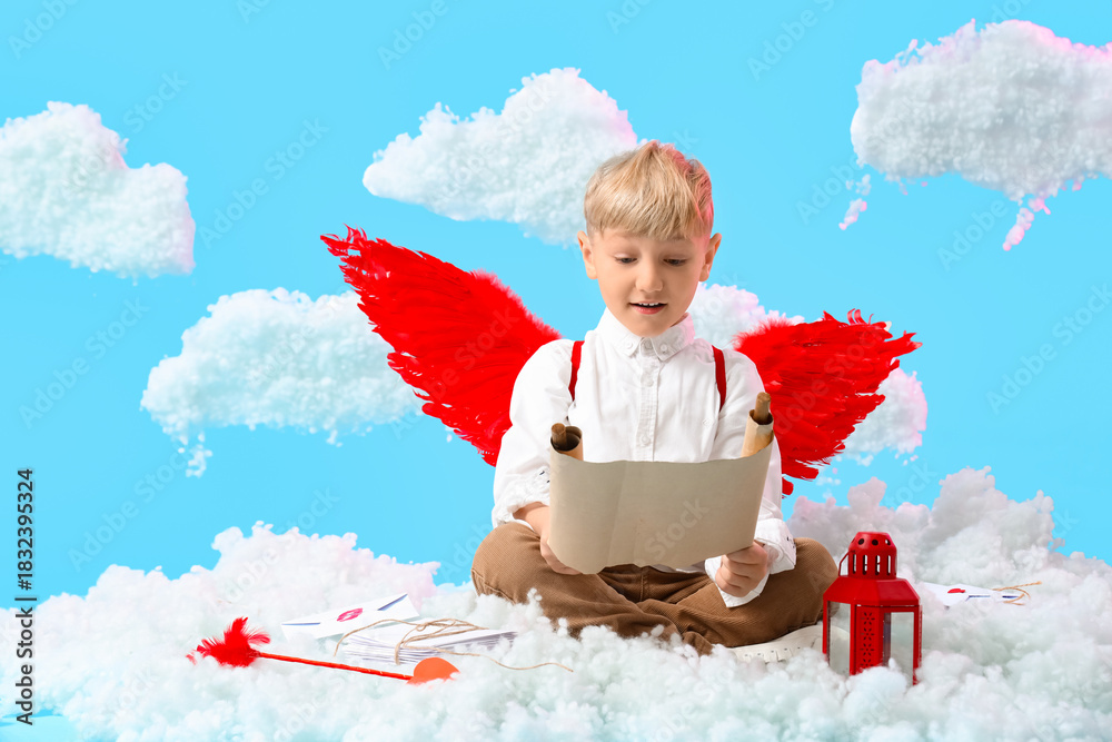 Fototapeta premium Cute little happy boy dressed as cupid with love letters and scroll sitting in clouds on blue background. Valentine's Day celebration