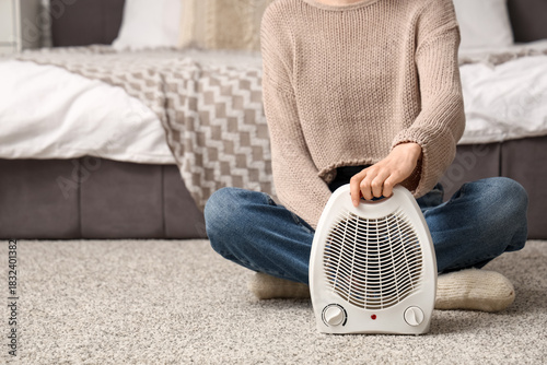 Woman in cozy sweater and j...