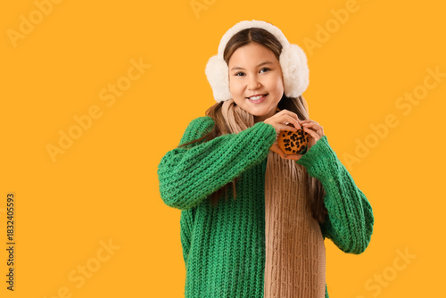 Cute teenage girl in warm c...