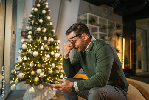 Stressed man experiencing burnout during christmas holidays